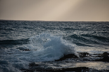 waves crashing on the rocks