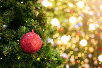 decorated Christmas tree with soft-focus and over light in the background