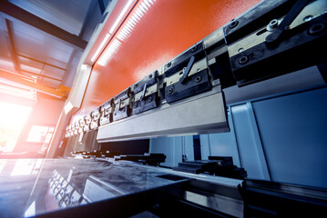 Modren hydraulic bending machine at metal manufactory - obrazy, fototapety, plakaty