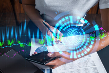 Financial chart hologram and a woman signing contract use phone. Double exposure. Analysis concept.