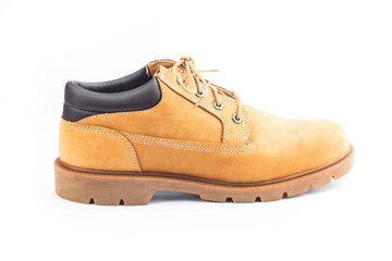 Yellow nubuck leather men's boots on white background