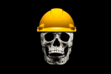 Human skull wearing yellow construction worker hard helmet. Isolated on black. The concept of work to the death.