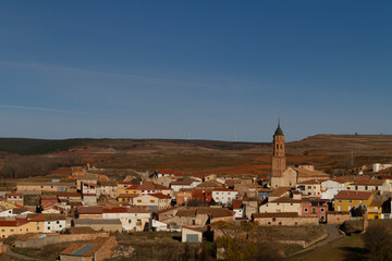 View of the Torrecilla del Rebollar town in the province of Teruel, Jiloca county, with the tower...