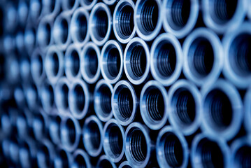 Abstract background of steel pipes stacked on a pallet