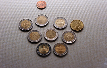 Photo of euro coins and cents on grey background. Money consept