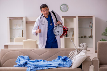 Young male paramedic visiting skeleton patient