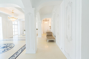 beautiful stylish chic rich clean bright blank interior. high white walls with large windows from floor the pattern on the floor