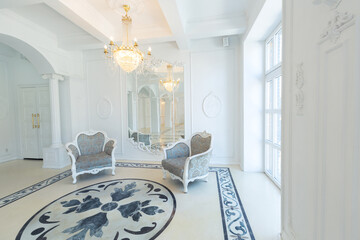 beautiful stylish chic rich clean bright blank interior. high white walls with large windows from floor the pattern on the floor