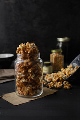 Glass jar of  homemade caramel popcorn