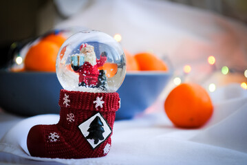 Snowball. Tangerines on the table, Christmas mood.