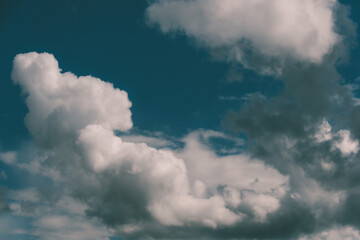 Picturesque clouds in blue sky on sunny day