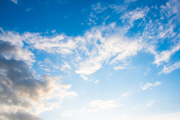 Picturesque clouds in blue sky on sunny day