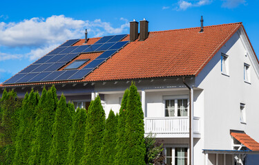Generic house photovoltaic system (house modified by image editing)