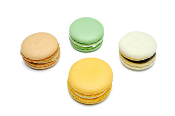 Sweet and colourful french macaroons or macaron on white background