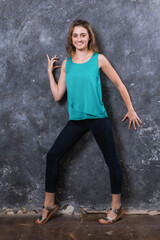 Naklejka premium Pretty young woman dressed in green shirt