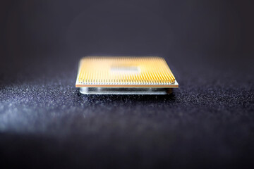 processor for a computer, replaceable plastic part of a modern gadget, photography with shallow...