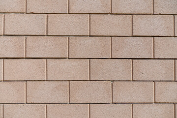 Gray Decorative concrete fence. High fence close-up. External fence selective focus.