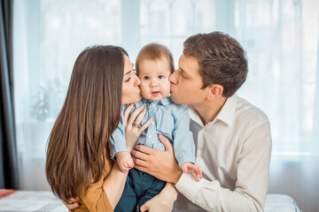 Obraz premium Caucasian family and a little baby boy