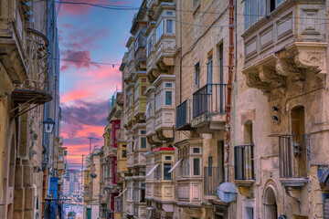 Fototapeta premium Typical architecture in Malta, wooden colorful balconies, Valleta, Malta