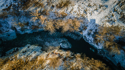 winter landscape on a frozen river in severe frost