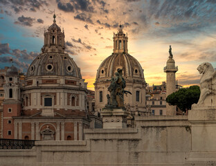 Fototapeta na wymiar golden hour in Rome Italy, view of Santa Maria di Loreto and palazzo Valentini domes from Venice square...