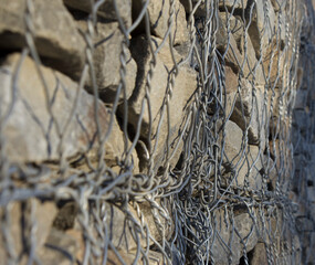 stones laid in an iron grid