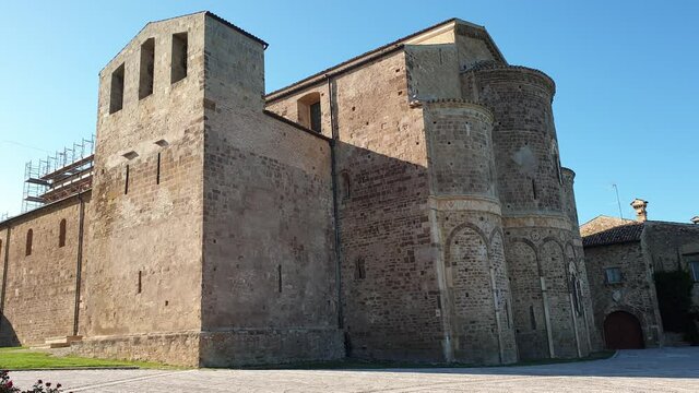 St. John in Venus abbey with three apses and bell tower. Fossacesia, Italy