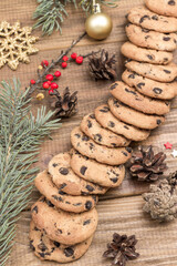 Cookies with raisins among fir branches and cones