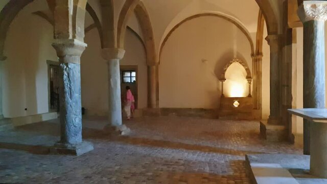 Tourists in crypt of San Giovanni in Venere, Italy. Slow-motion
