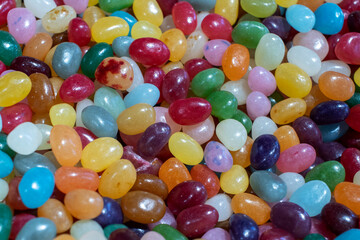 Nut candy dragees covered with colorful glaze.