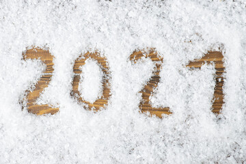 New Year 2021. Numbers in the snow.
