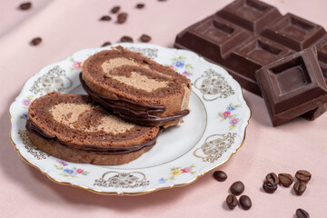sweet roll with chocolate and coffee