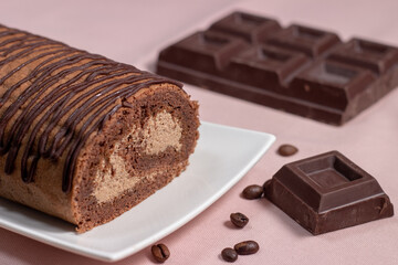 sweet roll with chocolate and coffee