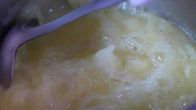 Cooking  traditional catalan Christmas soup in Slow Motion.  Escudella.