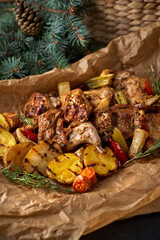 delicious Braised Rabbit with vegetableson old dark table, christmas festive dinner recipe