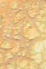 Paint peeling on old metal machinery