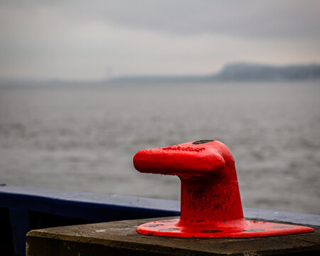 boat ancher dock water rainy
