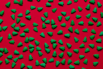 christmas red background with green trees