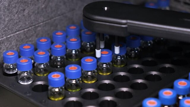 Auto sampler of HPLC in process. Testing of medical samples. 