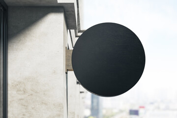 Blank black outdoor stopper on city background.
