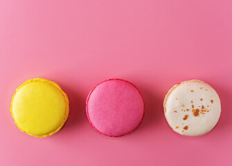 Multicolor macarons with chocolate berry cream cheese filling