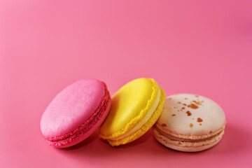 Multicolor macarons with chocolate berry cream cheese filling