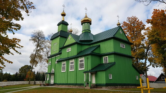 
st michaels orthodox green wooden church in trześcianka (podlasie, poland) 