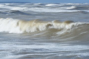 Stormy sea at sunset, Baltic, pink, orange, soft pastel colors

