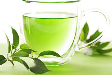 cup of fresh tea, fresh tea leaves