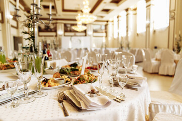 table, restaurant, dinner, wedding, glass, setting, party, banquet, food, wine, dining, luxury, plate, decoration, interior, reception, fork, celebration, white, napkin, tablecloth, catering, elegant,