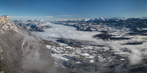Panoramic view from Vercors mountain range of Grenoble covered by snow  in winter