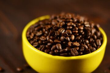 Roasted coffee beans on a wooden table