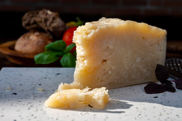 Cheese collection, aged hard Italian sheep cheese black pecorino from Sicily island or pecorino nero di Sicilia.