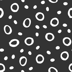 Doodle dots seamless pattern. Hand drawn circles background. Monochrome texture.